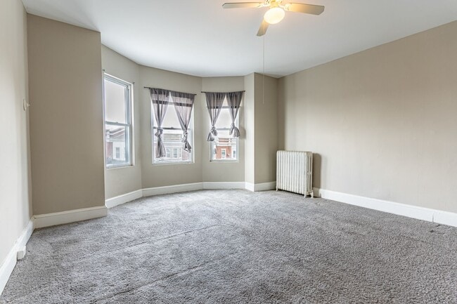 Building Photo - Charming 3-Bedroom with High Ceilings & Modern Updates