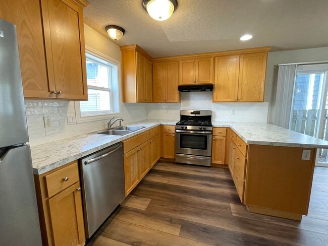 Building Photo - Lovely St Johns Home with Attached Garage, Outdoor Space, Washer/Dryer In Unit