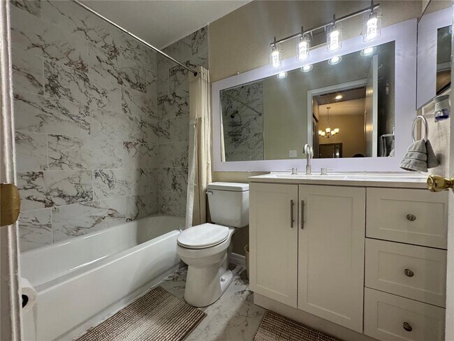 Building Photo - 7249 Parkside Villas Dr N