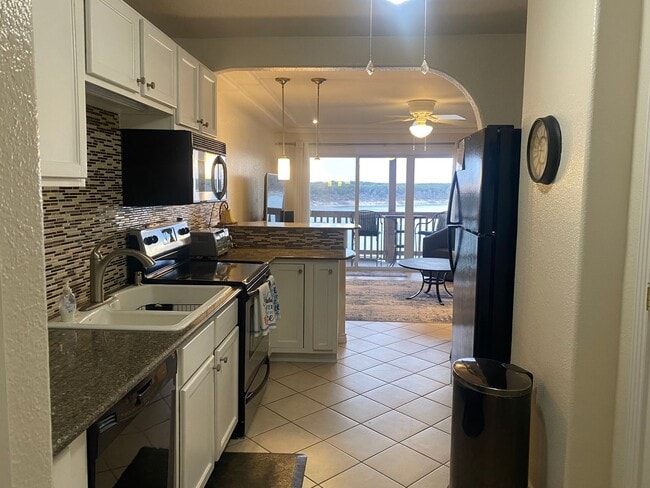 Building Photo - FURNISHED STUDIO CONDO WITH A MILLION DOLLAR LAKE VIEW