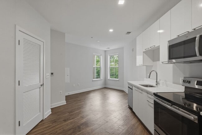 Building Photo - Experience modern living in this beautifully appointed junior one-bedroom/studio featuring an ope...