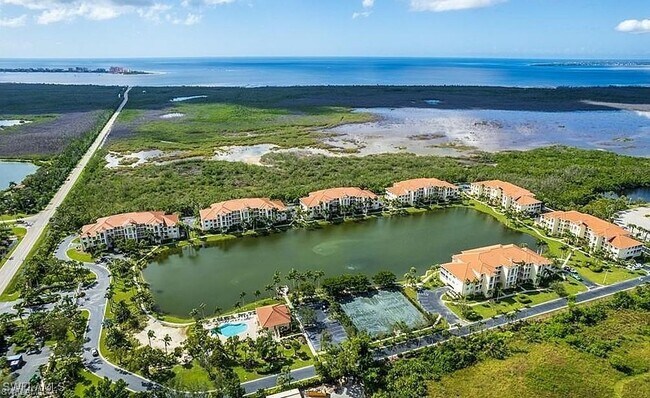 Building Photo - 20051 Sanibel View Cir