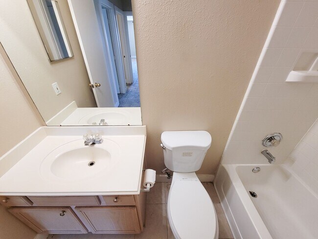 Building Photo - 3 bedroom one story home on large corner lot. Home has hard flooring throughout living areas and ...