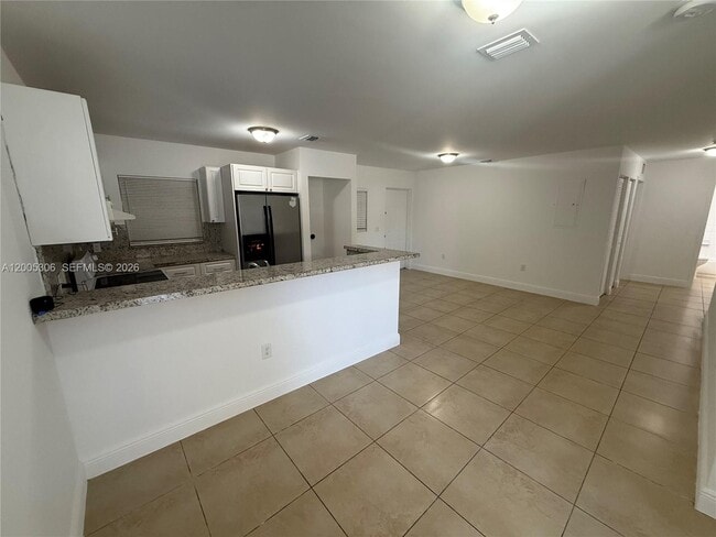 Building Photo - 1565 NW 47th St