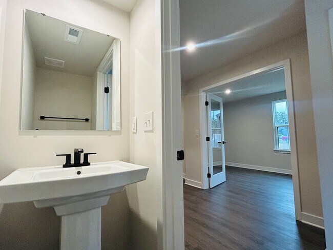 Building Photo - New Construction • 4 BR • 2 Full / 2 Half BA • End Unit Townhome in Village Town – Fayetteville’s...