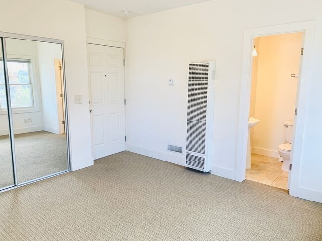 Building Photo - STUDIO WITH A PEAK VIEW OF DOWNTOWN! $1,49...