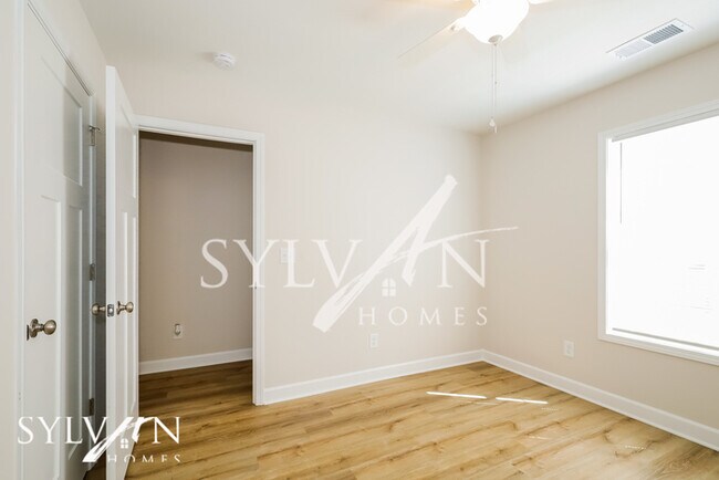 Building Photo - Lease today! No extra charge for contentme...
