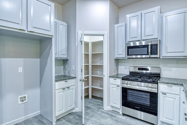 Building Photo - Brand New Construction!  Lawn care provided!