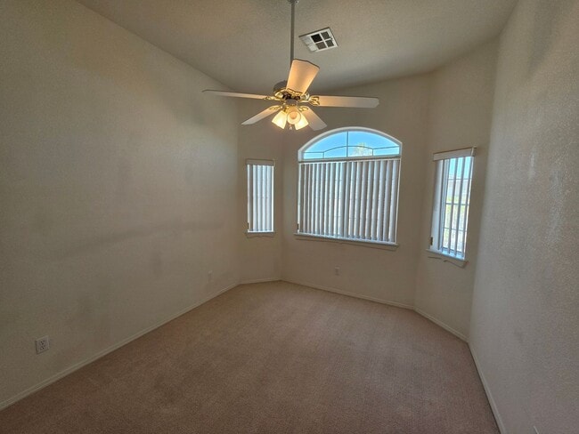 Building Photo - Spacious 3-Bedroom Home with RV Parking & 3-Car Garage in Bullhead City