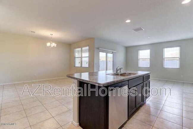 Building Photo - 37748 W Bello Ln