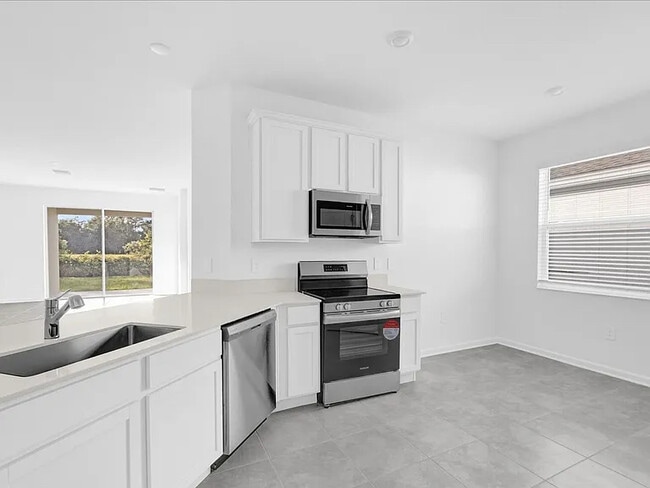 Building Photo - 4391 Pebbles Throw Dr