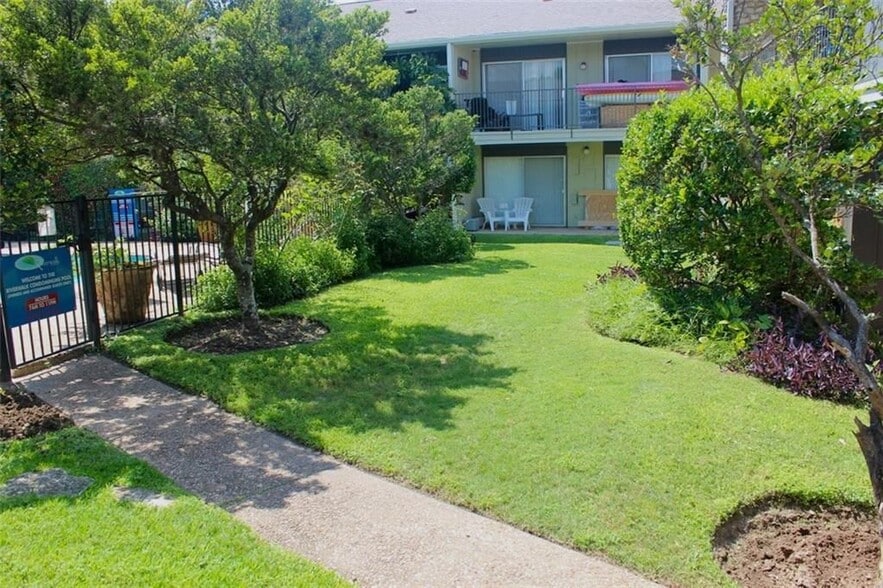 Pool directly off back porch of studio - 500 E. Riverside Dr.