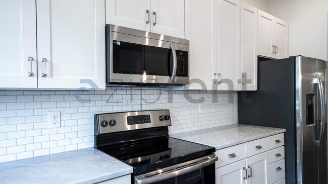 Building Photo - 1346 Calash Ave