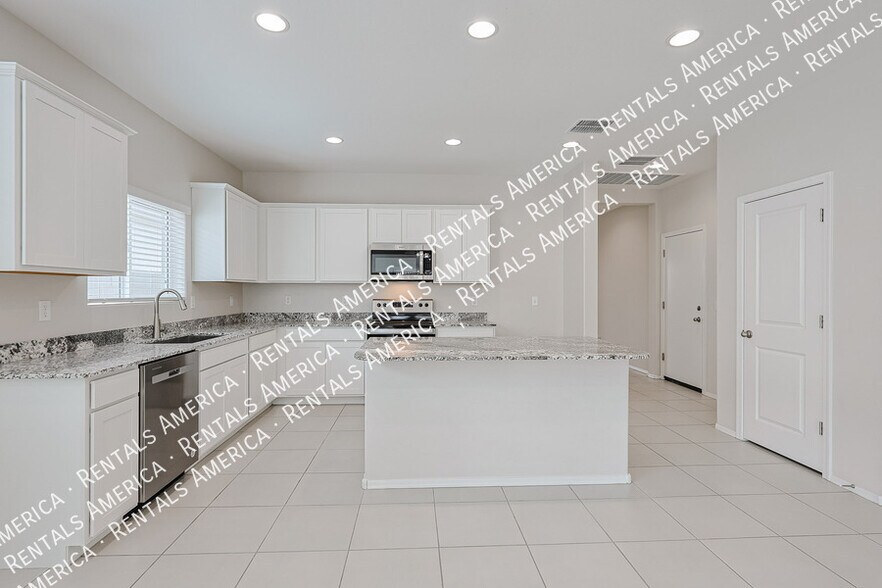 Building Photo - 10338 W Wier Ave