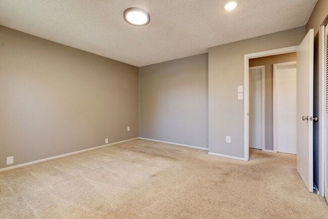 Building Photo - Spacious 4-Bedroom Home with Private Backy...