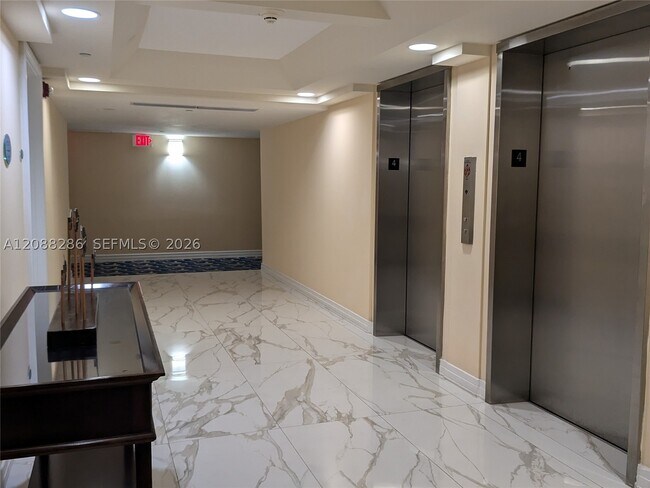 Building Photo - 6917 Collins Ave