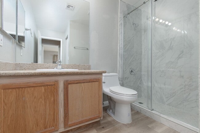 Building Photo - Remodeled first floor unit in gated commun...