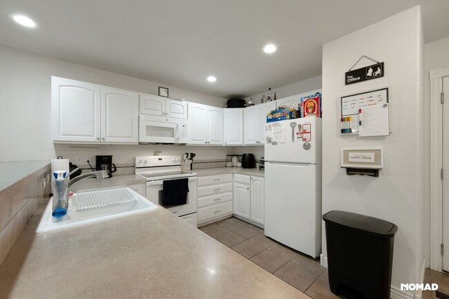 Building Photo - Spacious 4BR Townhome in Greeley