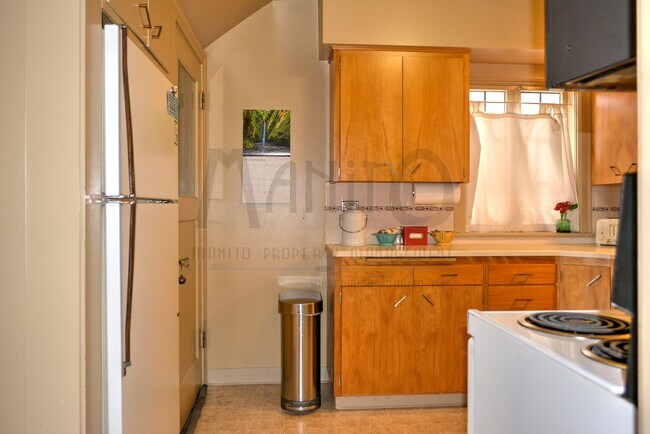 Building Photo - **COMING SOON** Beautiful Down River Brick Bungalow with River Views