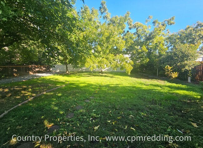 Building Photo - Spacious House with Landscaper Included Av...