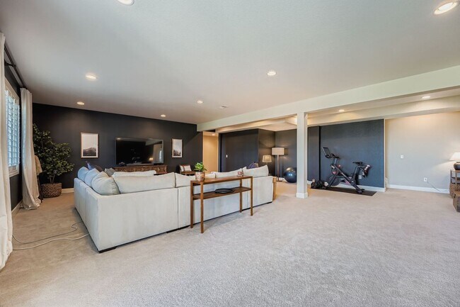 Building Photo - Beautifully maintained 5-bedroom home with a large finished basement, club access, and top-rated ...