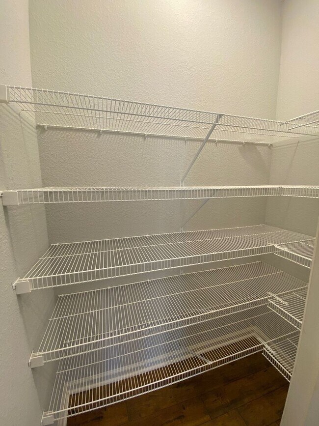 Building Photo - Introducing a stunning Condo with a coasta...