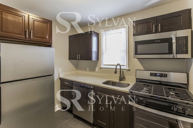 Building Photo - Enjoy living the good life in this 4 bedro...