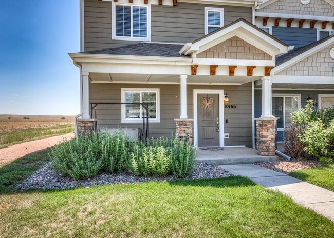 Building Photo - Cute End Unit 3 Bedroom Townhome in Lorson Ranch Next to Open Space