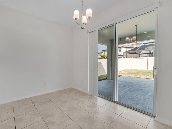 Building Photo - 7323 Pool Compass Loop