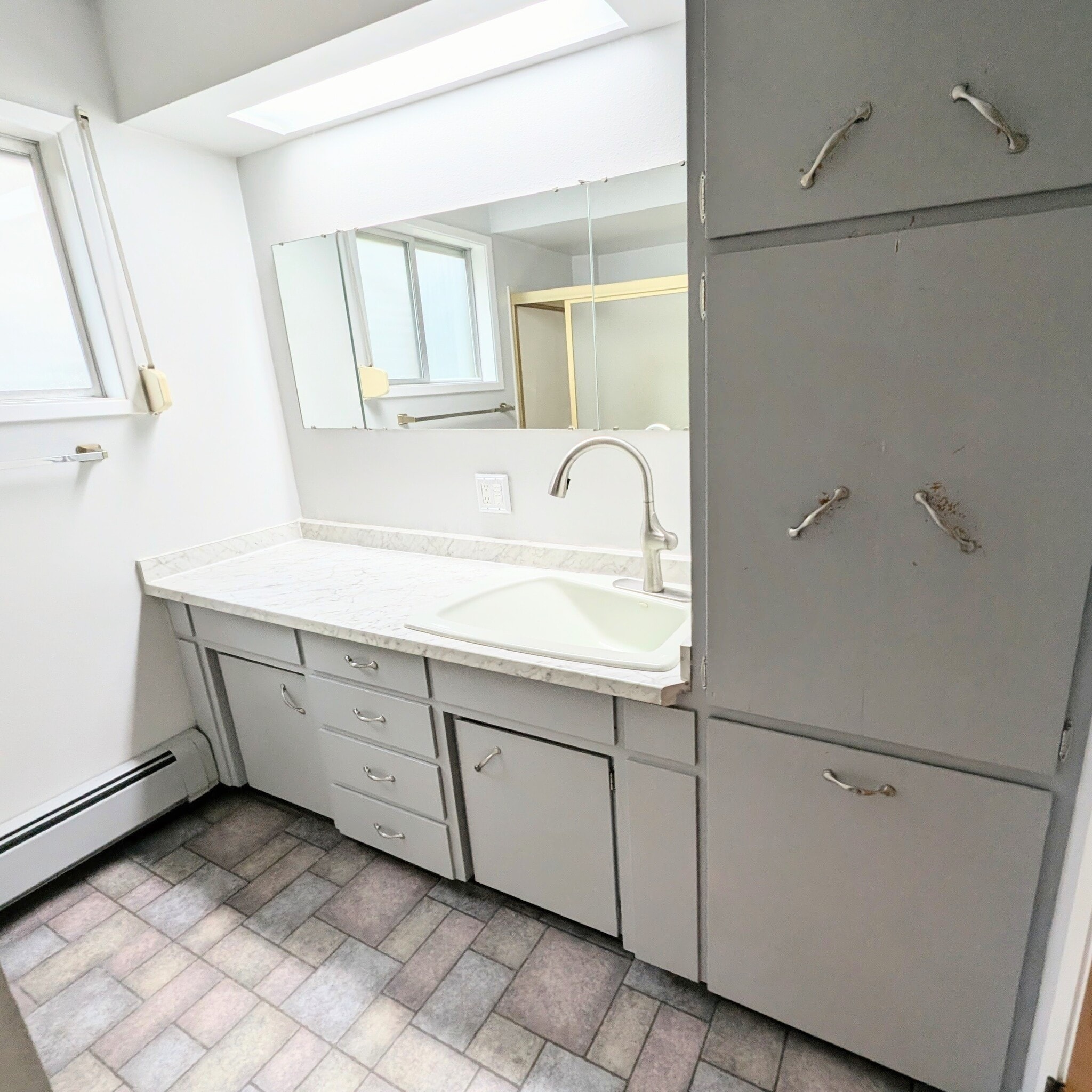 updated bathroom with storage - 2575 Yew Street Rd