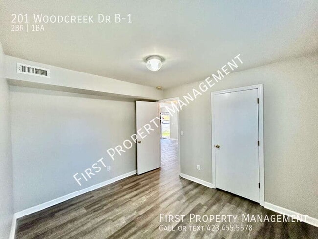 Building Photo - 201 Woodcreek Dr