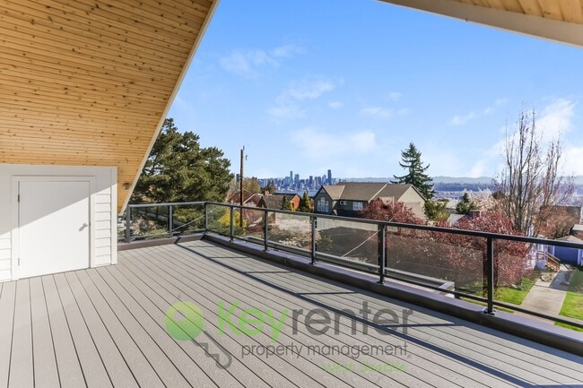 Building Photo - Spacious Living with Balconies, Deck, and Private Yard