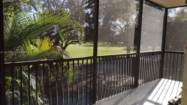 Building Photo - 200 Jacaranda Country Club Dr
