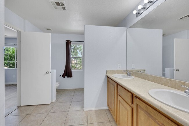 Building Photo - Updated Two-Story 3 bed/2.5 bath Home with Open Kitchen, Attached 1 Car Garage & Modern Flooring ...