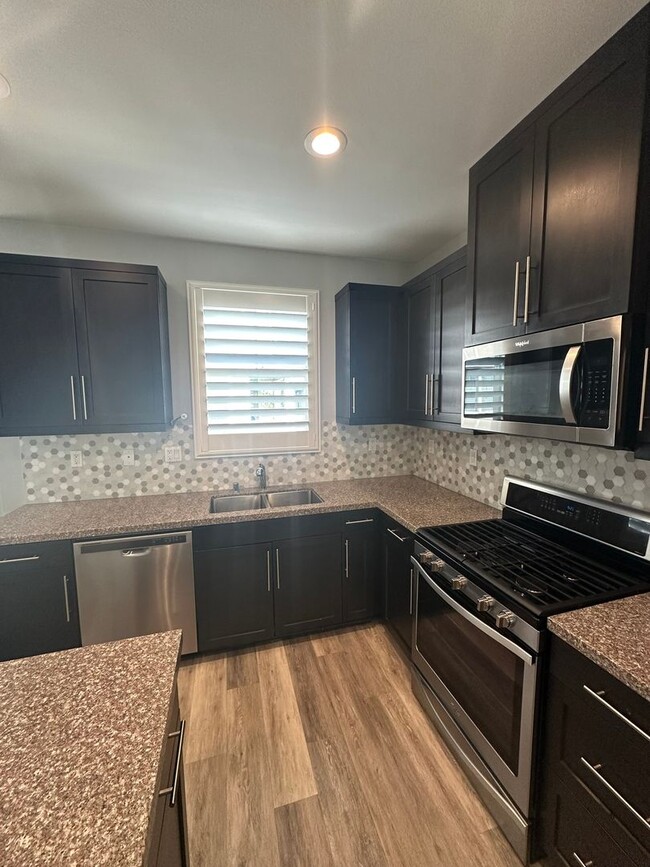 Building Photo - BAYSIDE LANDING - Available Now! 3-story t...