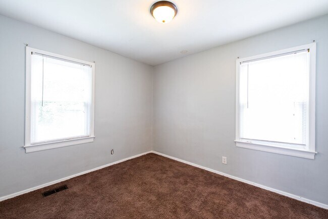 Building Photo - Charming 2-Bedroom Home with Bonus Attic S...