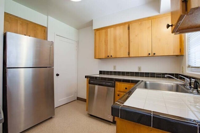 Building Photo - Tranquil Mid-Century Retreat in a Lush Set...