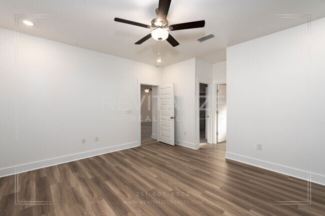 Building Photo - HALF-DEPOSIT SPECIAL! Charming Gold Fortified Home in Live Oak Estates – Near Downtown Fairhope!