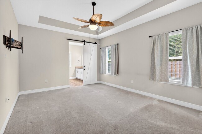 Building Photo - Modern 4-Bedroom Rental with Screened Patio & 2-Car Garage