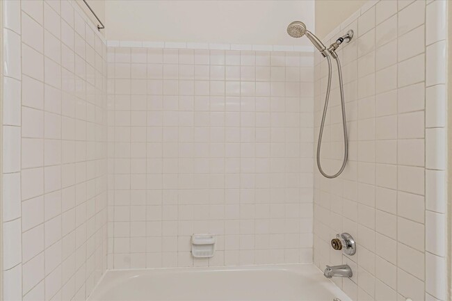 Building Photo - Stylish End-Unit Condo l Private Patio l C...