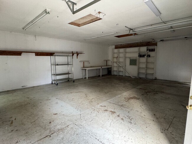 Building Photo - 3br/2ba house with finished basement, two car garage/shop and fully fenced yard  **CENTRAL AC**