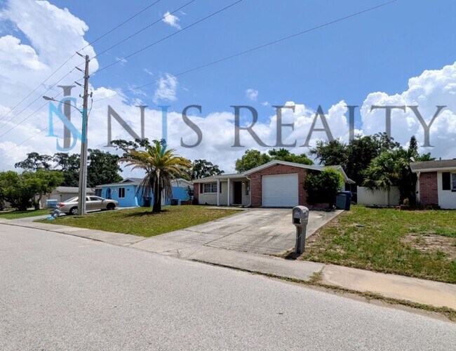 Building Photo - REDUCED!!!!  True 3 Bed~2 Bath~with garage. Over 1,000 sq ft, with updated kitchen & bathrooms, l...