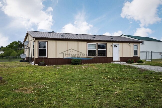 Building Photo - Country Home with Fenced Yard in Hayden!