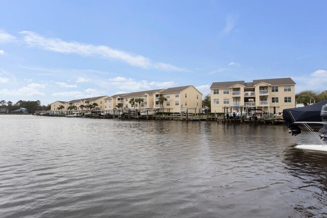 Building Photo - Welcome to Harbor Landing Condominiums — where coastal living meets convenience!