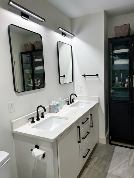 Dual vanities and lighted mirrors - 1819 Baltimore Ave