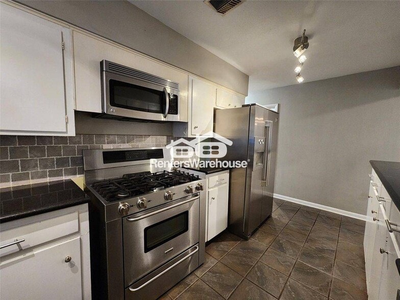 Building Photo - 6418 Woodbrook Ln