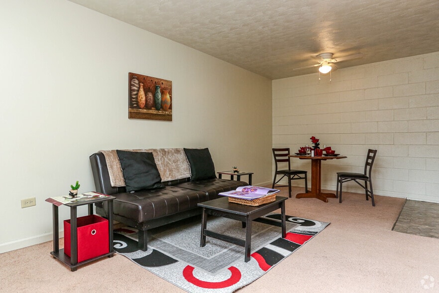 2BR, 1BA - Living Room - THE QUADS APARTMENTS