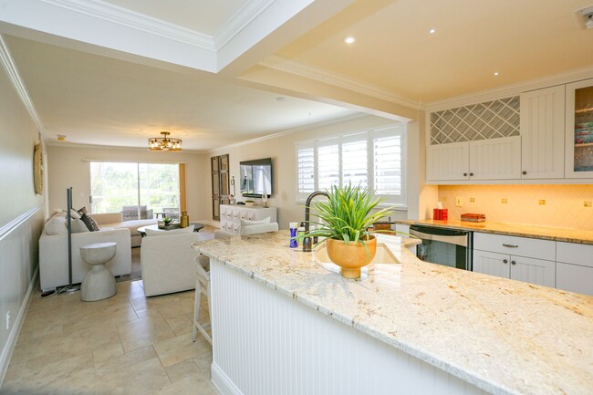 Building Photo - Live the Naples Lifestyle – Elegant 2BR/2B...