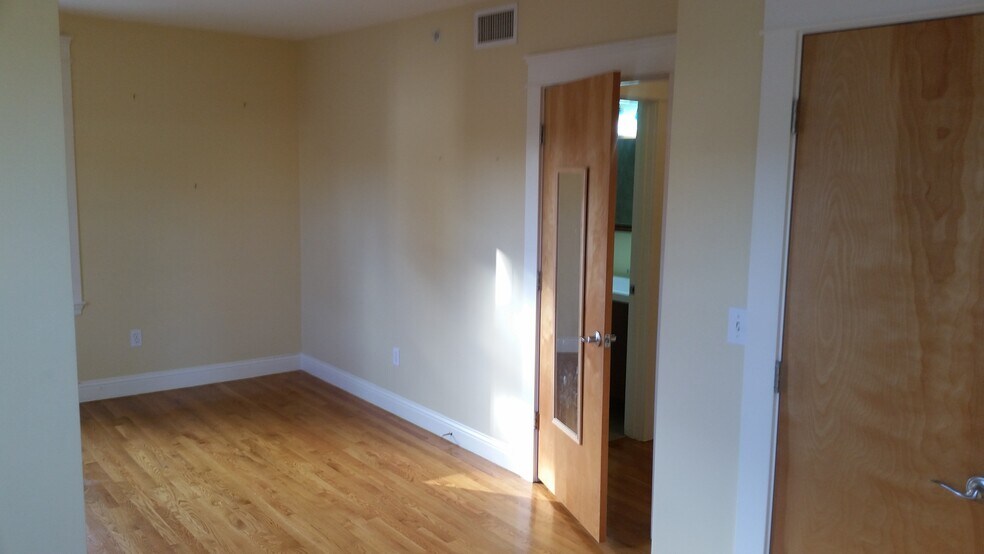Bedroom corner opposite two windows - 341 Hurley St #3