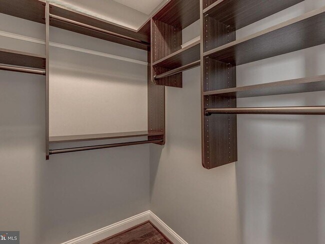 Building Photo - Beautiful EOG 3 bedroom  2.5 bath townhome with a 2 car garage and roof top deck overlooking the ...